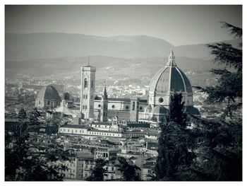 Cityscape with mountain in background