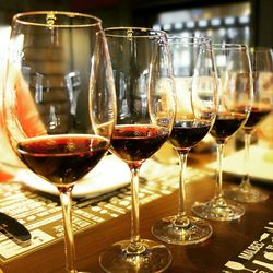 Close-up of wine glasses on table