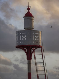 Low angle view of lighthouse against sky