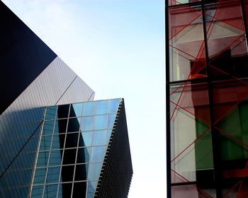 Low angle view of modern building against clear sky