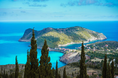 Scenic view of sea against blue sky