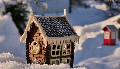 Traditional building against sky during winter