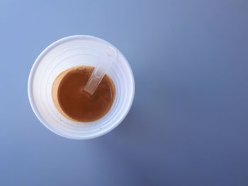 High angle view of coffee cup on table