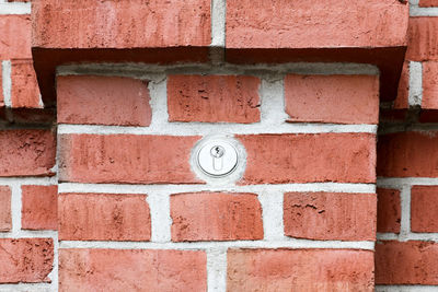 Security lock in a brick wall