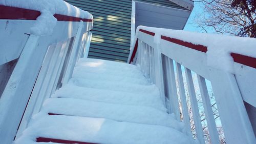 Staircase on snow covered steps