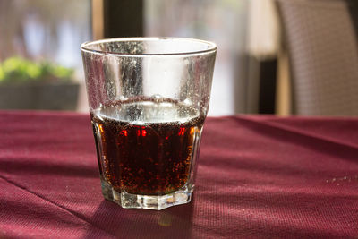 Close-up of beer in glass on table