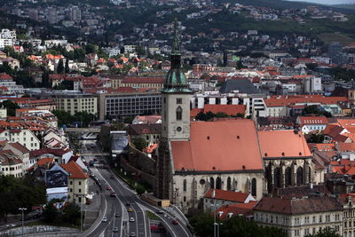 Church amidst buildings in city