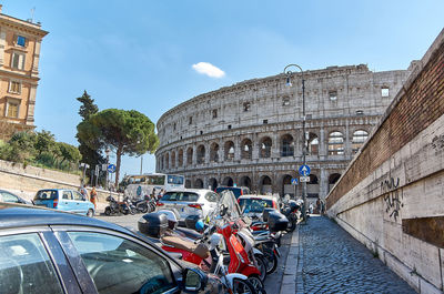 Panoramic view of people on street against sky