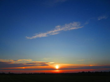 Scenic view of silhouette landscape against sky during sunset