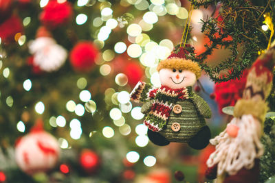 Close-up of christmas decoration hanging on tree