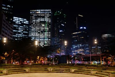 Illuminated buildings in city at night