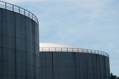 Low angle view of factory against sky