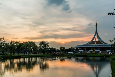 Scenic view of lake against sky during sunset