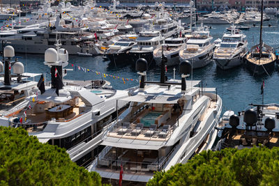 Boats moored at harbor