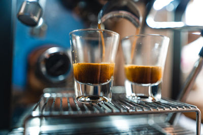 Close-up of coffee on espresso machine