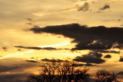 Low angle view of cloudy sky at sunset