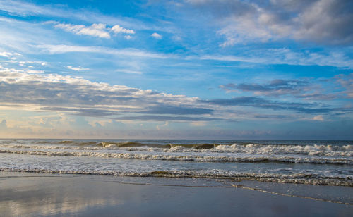 Scenic view of beach against sky