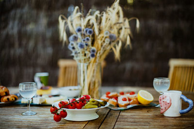 Fruits in bowl on table