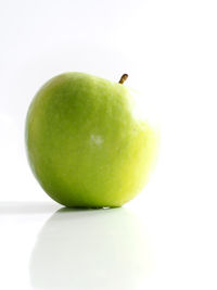 Close-up of fruit apple on white background