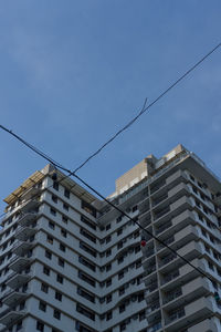 Low angle view of buildings against sky