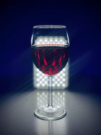 Close-up of wineglass on table