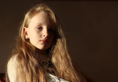 Close-up portrait of a girl looking away