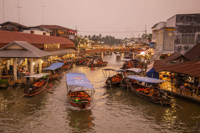 Boats moored at harbor