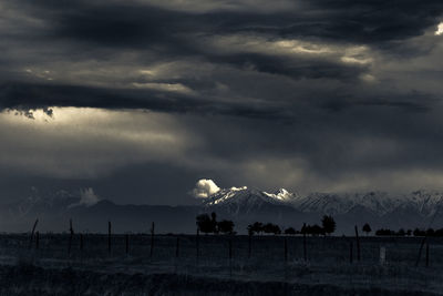 Scenic view of dramatic sky over landscape