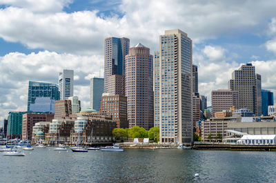 Modern buildings in city against sky