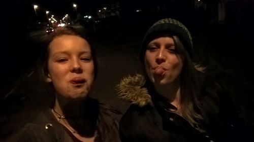 Beautiful young woman at night