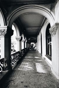 Woman walking in corridor