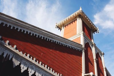 High section of building against cloudy sky