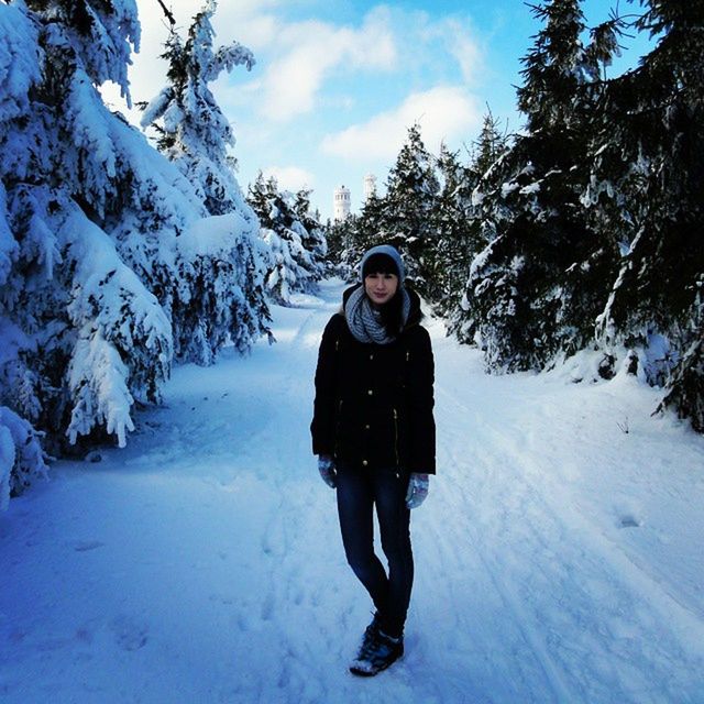 snow, winter, cold temperature, season, lifestyles, warm clothing, weather, leisure activity, full length, mountain, covering, white color, standing, looking at camera, frozen, nature, person, casual clothing