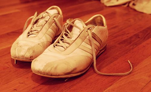 High angle view of shoes on wooden floor