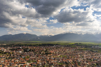 Aerial view of townscape against sky