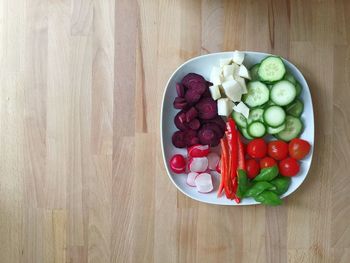 High angle view of fruits in bowl on table