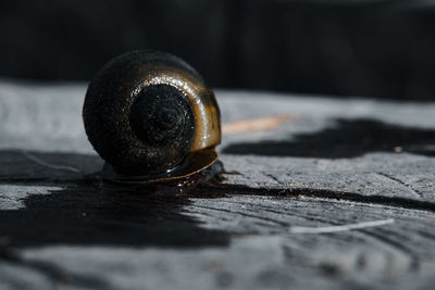 Close-up of old metal on table