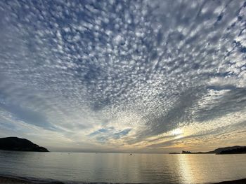 Scenic view of sea against sky at sunset