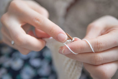 Close-up of woman's hands knitting