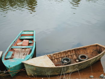 High angle view of abandoned boat moored at lake