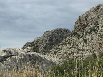 Scenic view of rocky mountains against sky