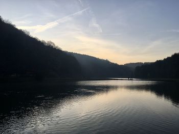 Scenic view of lake against sky during sunset