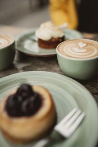 Close-up of coffee cup on table