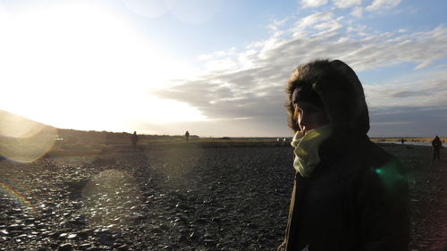 Rear view of woman looking at sea