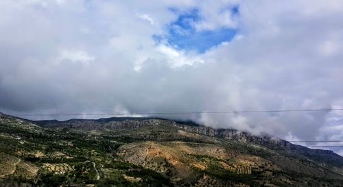 Low angle view of land against sky