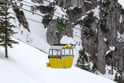 High angle view of car on snow covered field