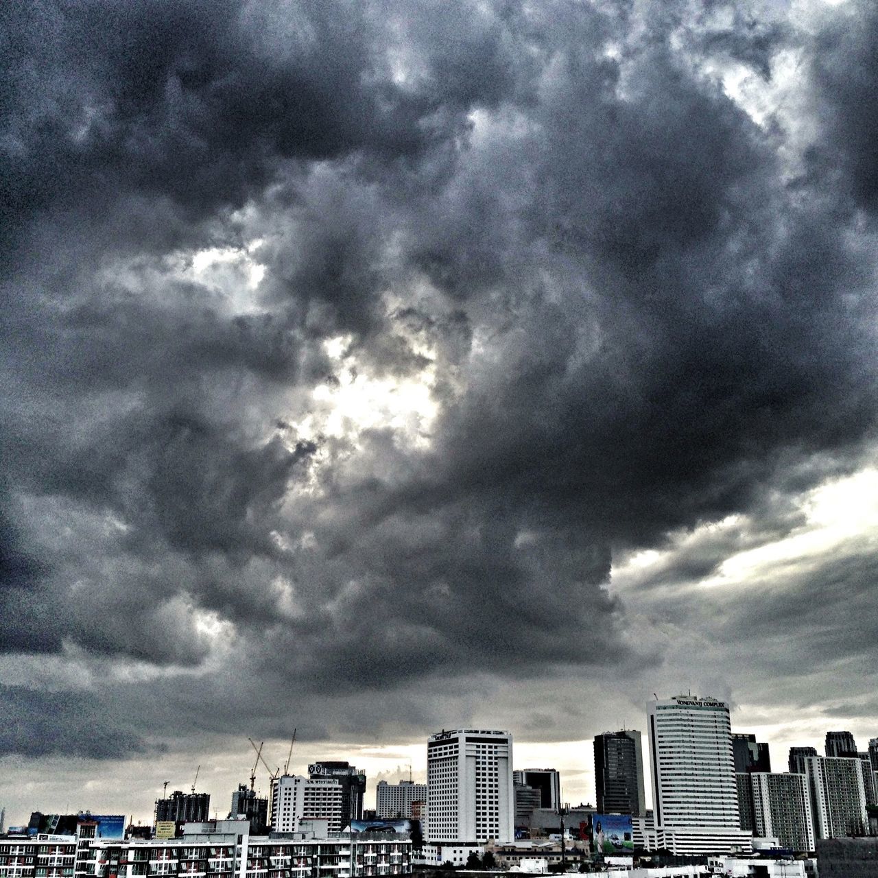 building exterior, architecture, built structure, sky, cloud - sky, cloudy, city, weather, overcast, cityscape, storm cloud, cloud, residential building, residential structure, building, residential district, cloudscape, outdoors, urban skyline, city life