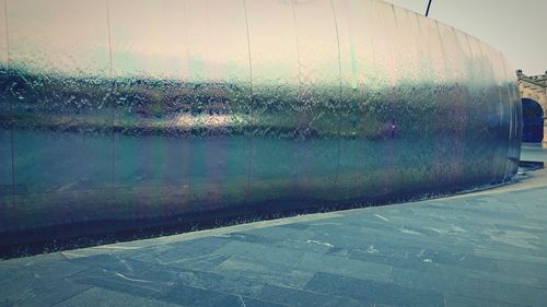 Road seen through wet window