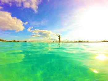 Scenic view of sea against cloudy sky