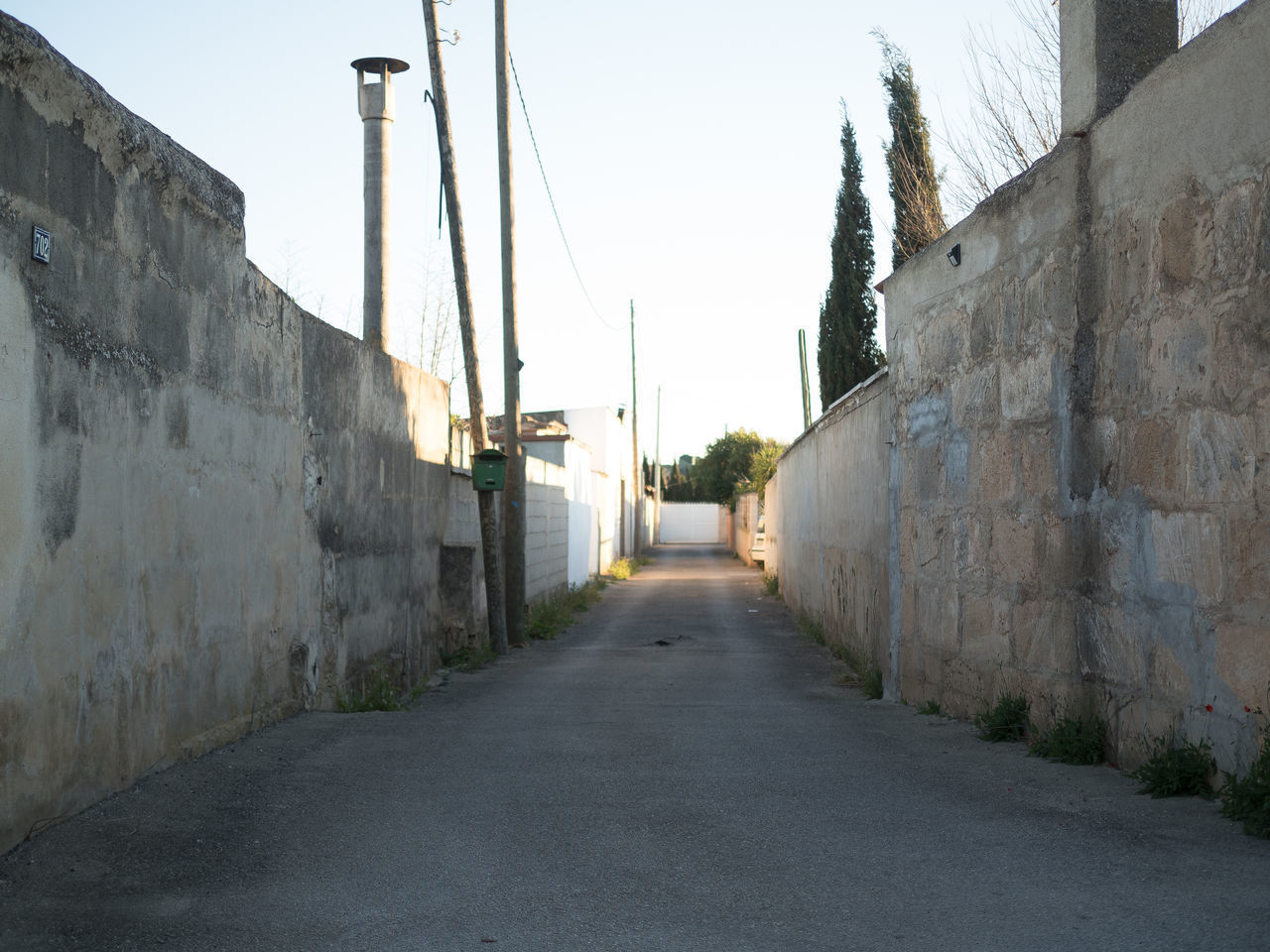 EMPTY ROAD ALONG BUILDINGS